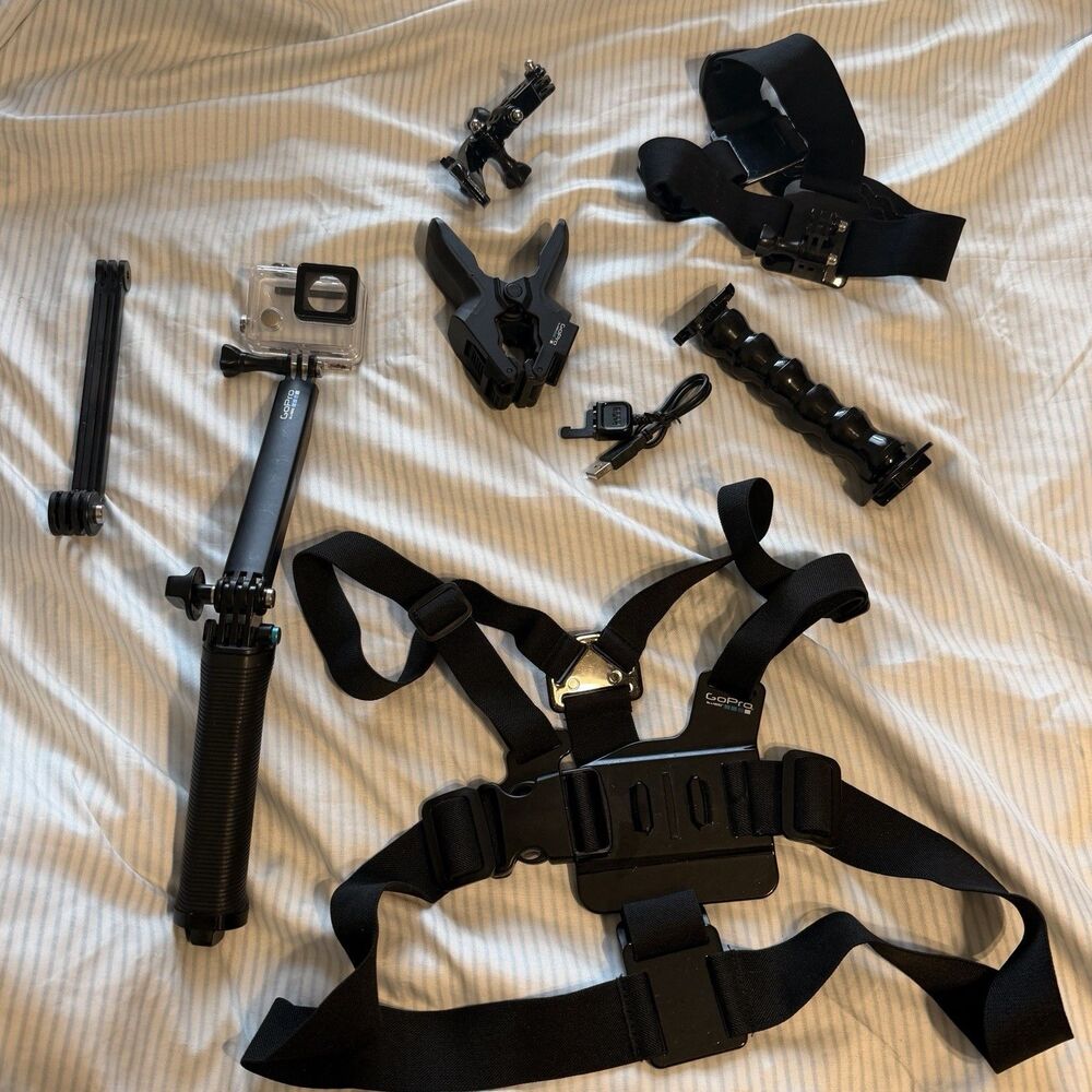 Lot of GoPro Go Pro Branded Accessories Stand Clips Cases